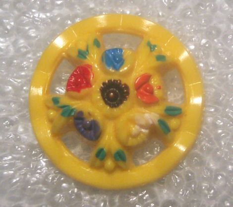 Pierced Plastic Floral Button