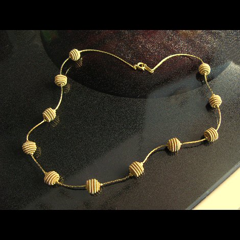 Golden Swirl Bead Necklace